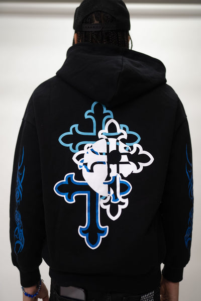 Large print of Triple cross design on back of Lafamilia hoodie